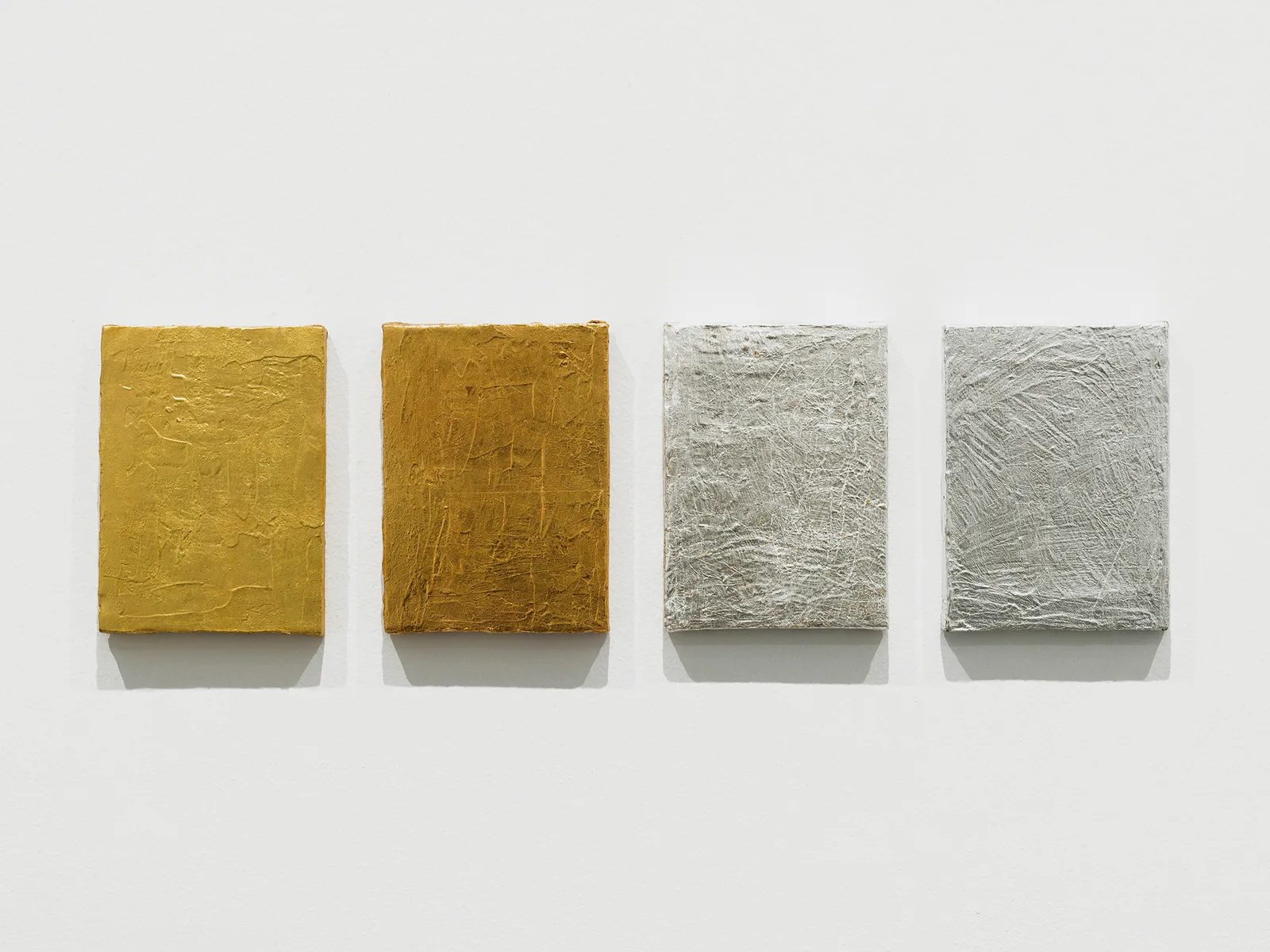 Oro/Latón/Plata/Aluminio [Gold, Brass, Silver and Aluminum]