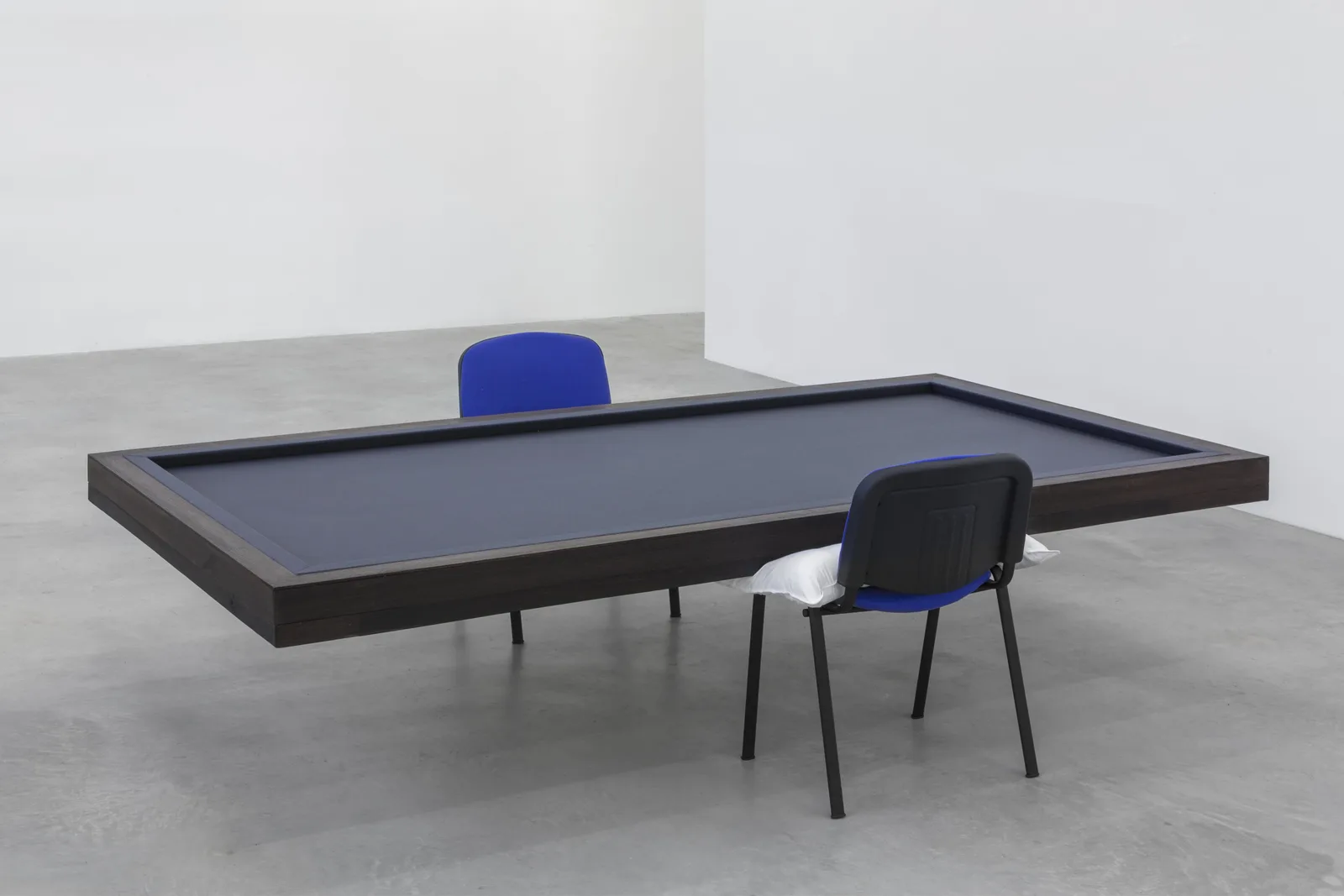 Not Titled (Biliard Table with gray fabric and two blue chairs)