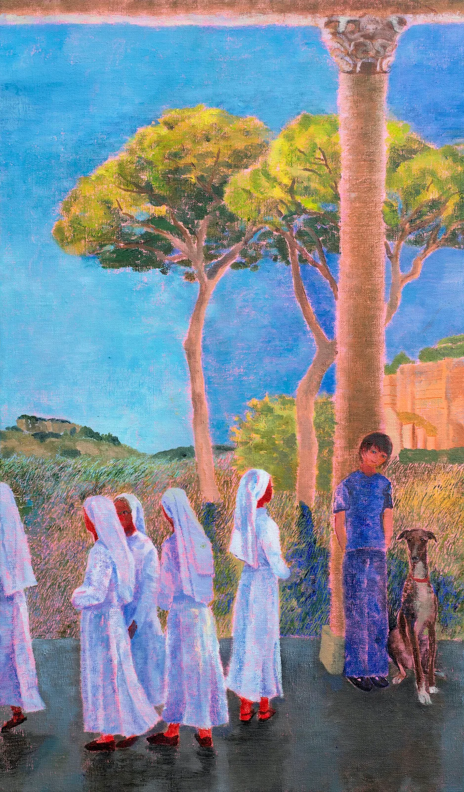 A group of nuns, a boy and a dog at an arcade